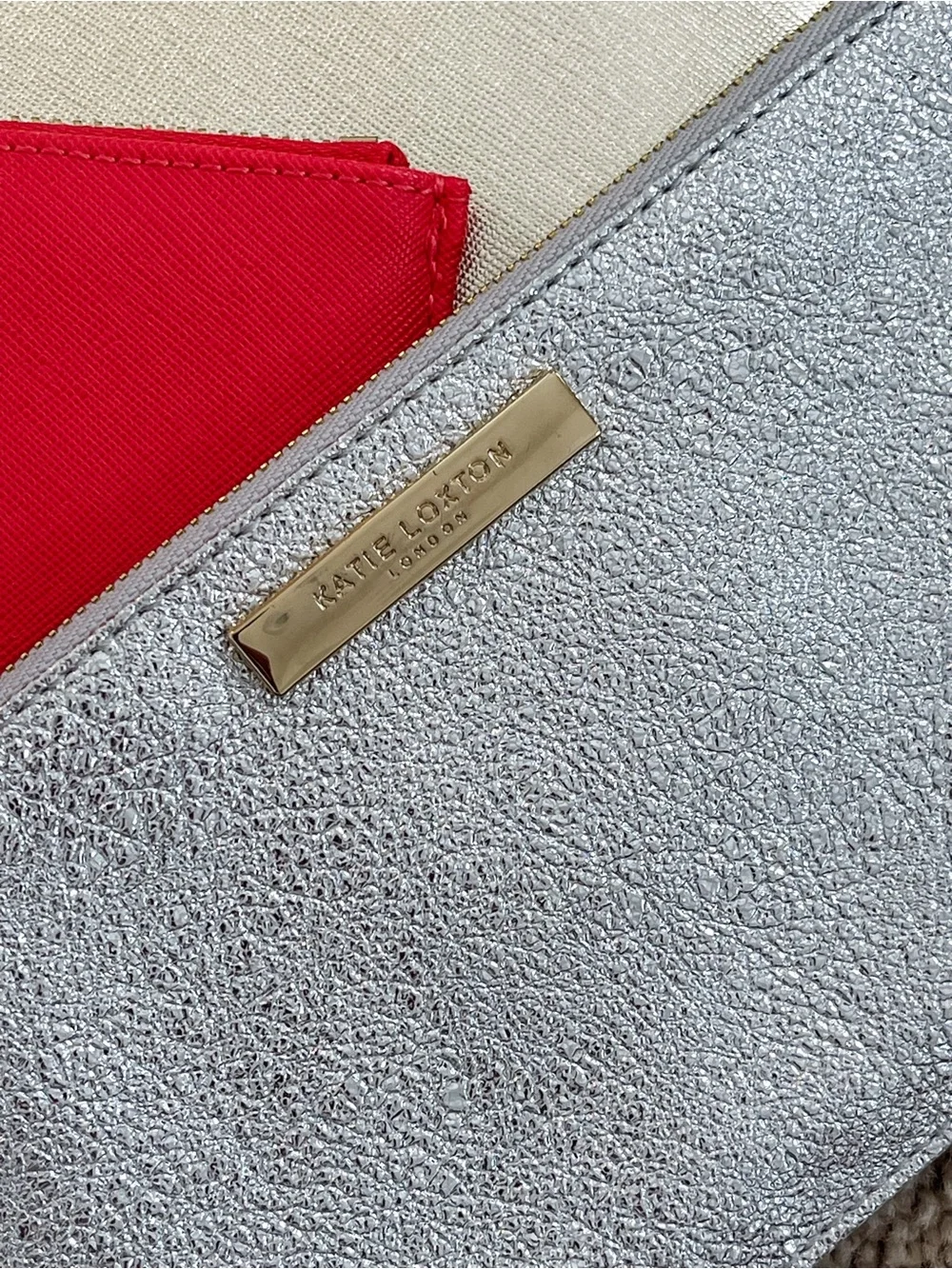 Set of three flat pouches by Estella Bartlett and Katie loxton
